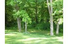 Property photo 1 - Quality 5,391 sq. ft. Estridge built home on 1.87 acre wooded lot